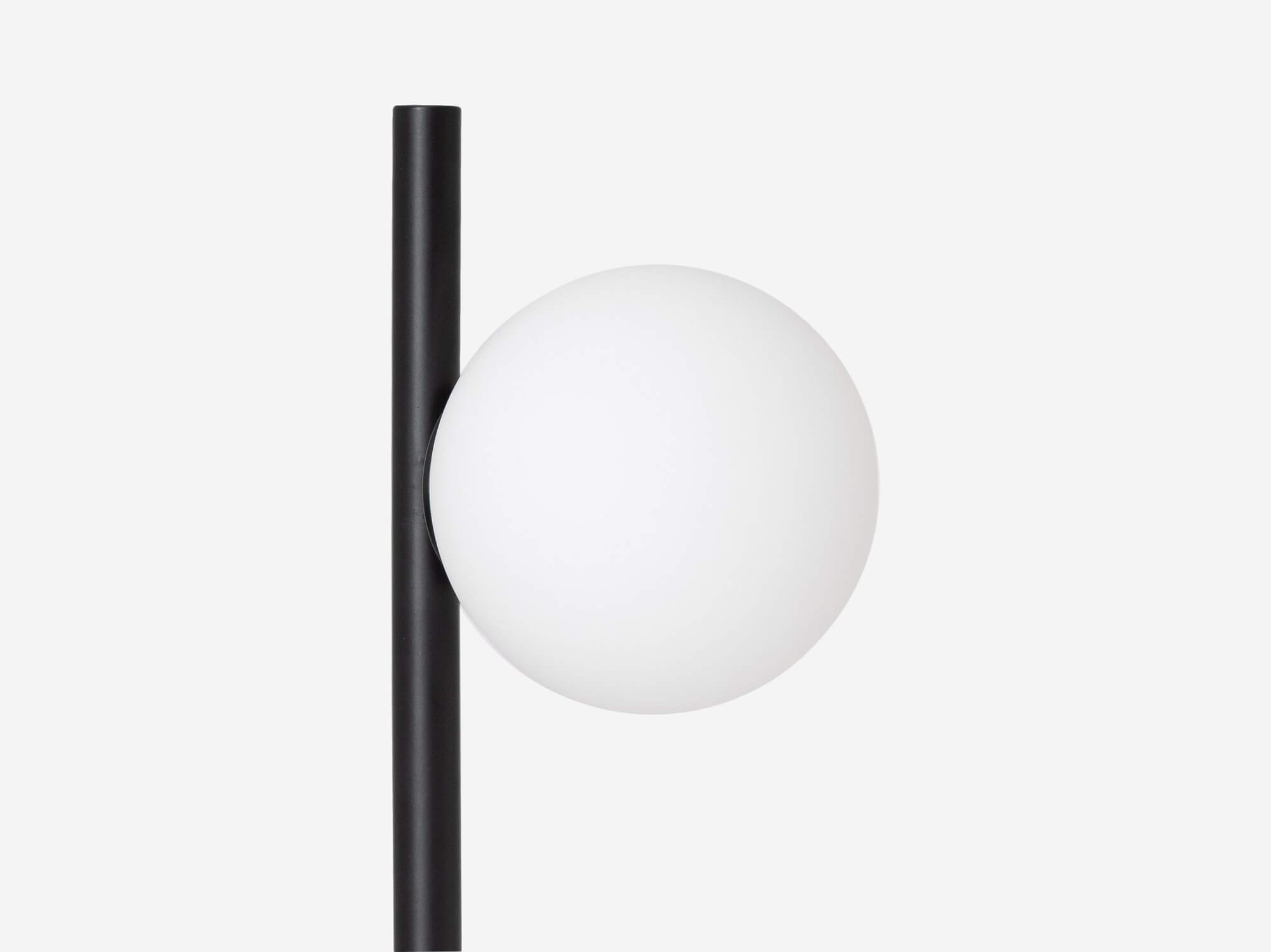 detail view of the eq3 black stem table lamp